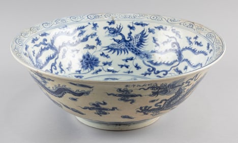 CHINESE BLUE AND WHITE PORCELAIN BOWL Qing Dynasty, Late 19th Century Height 5.5". Diameter 15".