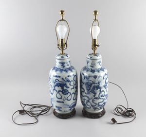 PAIR OF CHINESE BLUE AND WHITE PORCELAIN COVERED JARS Jar heights 15".