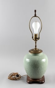 CHINESE CELADON PORCELAIN OVOID JAR Late 19th/Early 20th Century Vase height 9". Total height 26".
