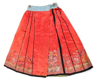 CHINESE SALMON RED SILK NEEDLEWORK SKIRT Early 20th Century Length 35". Width approx. 31".