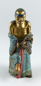 CHINESE CLOISONNE ENAMEL AND GILT METAL FIGURE OF AN EMACIATED LOHAN 19th Century Height 14".