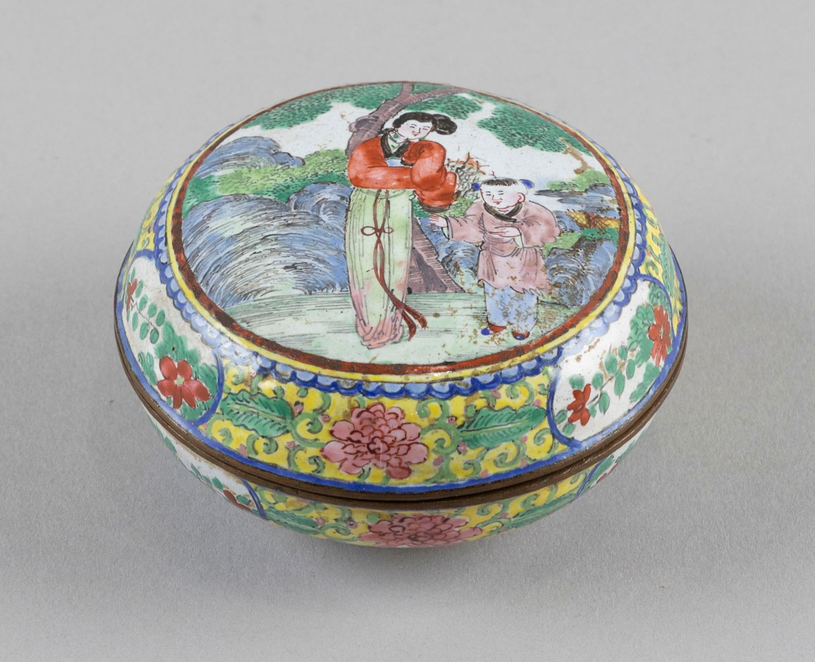 CHINESE FAMILLE ROSE CANTON ENAMEL SEAL PASTE BOX 19th Century Diameter 3".: CHINESE FAMILLE ROSE CANTON ENAMEL SEAL PASTE BOX19th CenturyCover depicts figures in a landscape. Sides with floral cartouches. Six-character Qianlong mark and label for Australian Antique Dealers As