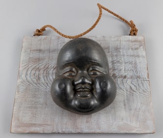 JAPANESE CAST IRON OKAME NOH MASK Early to Mid-20th Century Mask height 9". Width 7.5". Depth 3.5".