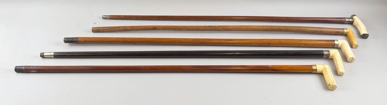 FIVE CANES Late 19th/Early 20th Century Lengths from 33" to 34.5". (1 of 8)
