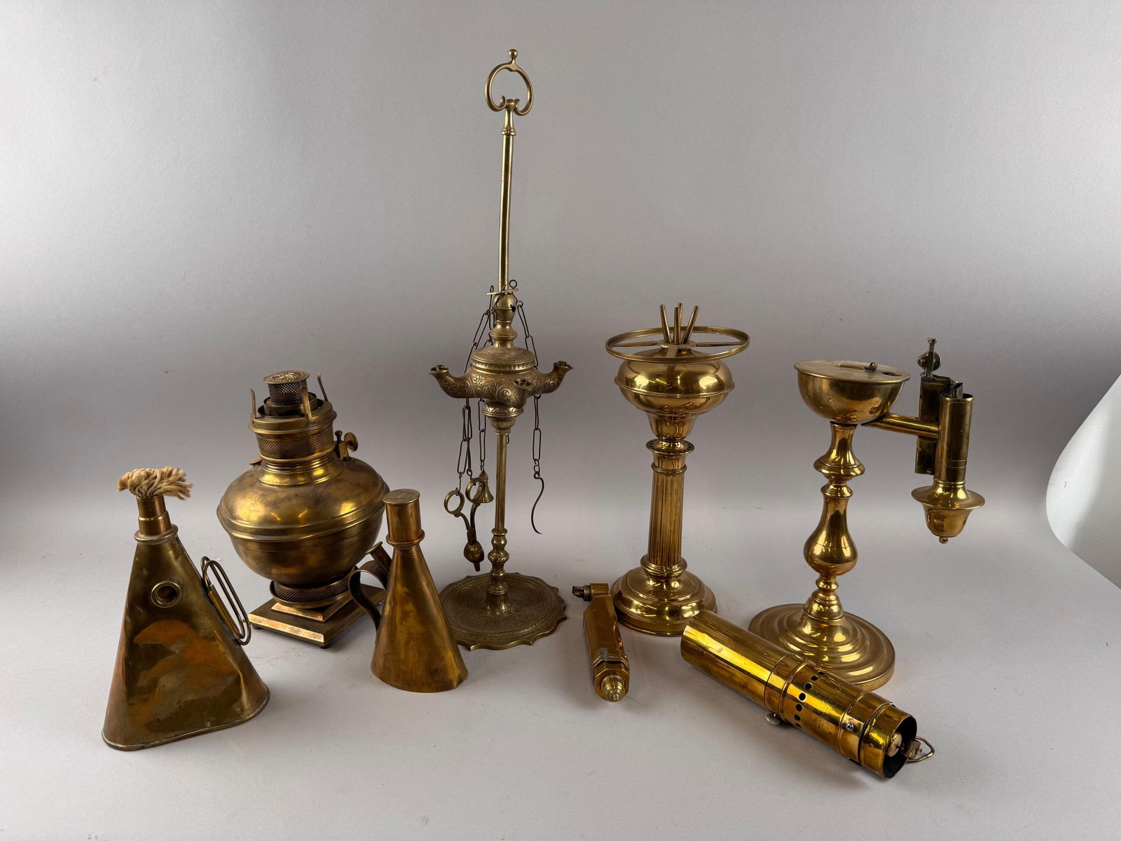 EIGHT BRASS LANTERNS 19th Century Heights from 7" to 20.5". (1 of 4)