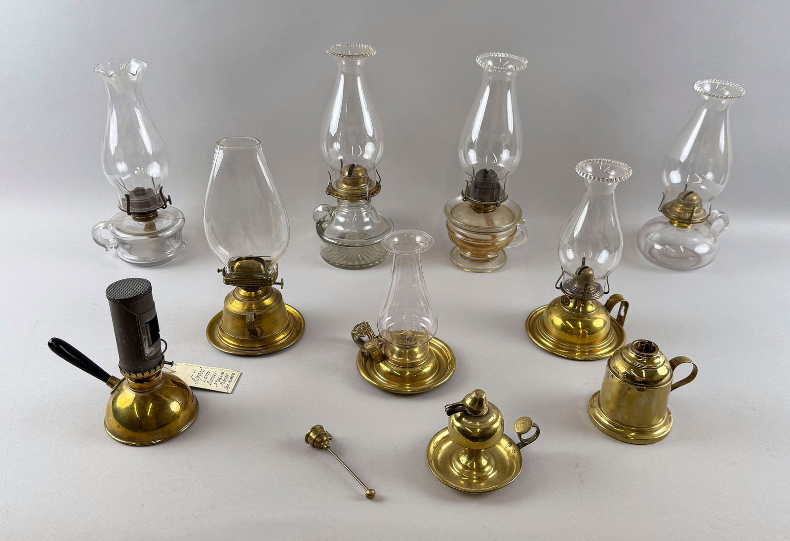 TEN BRASS AND CLEAR GLASS FLUID HAND LAMPS Late 19th/Early 20th Century Heights from 1.75" to 4" (1 of 7)