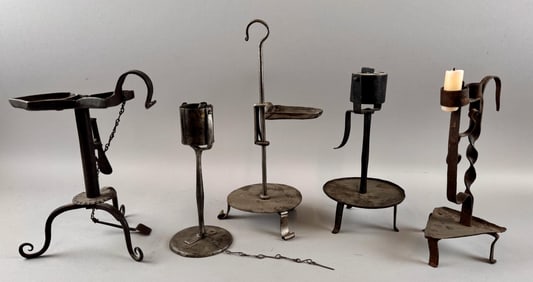 FIVE EARLY LIGHTING DEVICES 18th/19th Century Heights from 8.25" to 12.75".