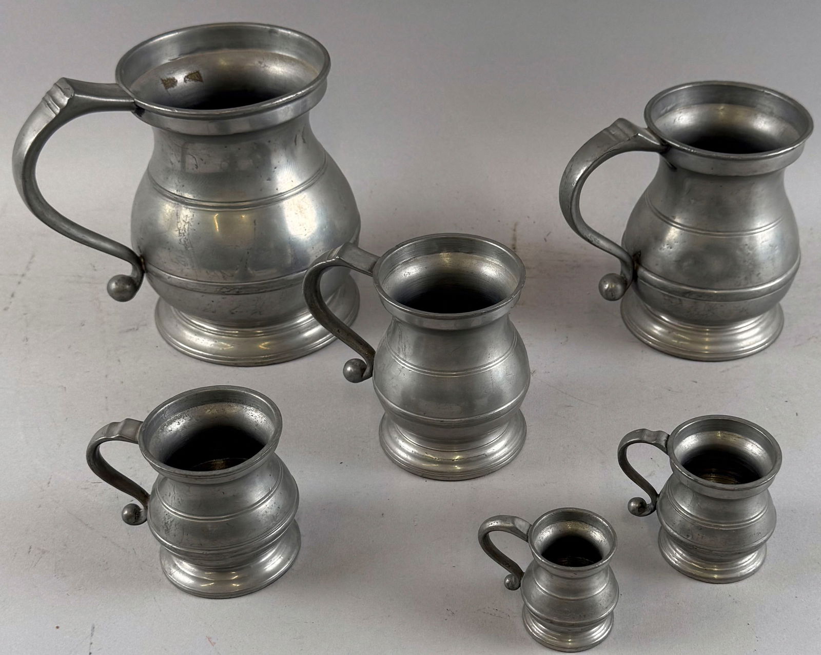 SIX PEWTER MEASURES 19th Century Heights from 2" to 6". (1 of 3)