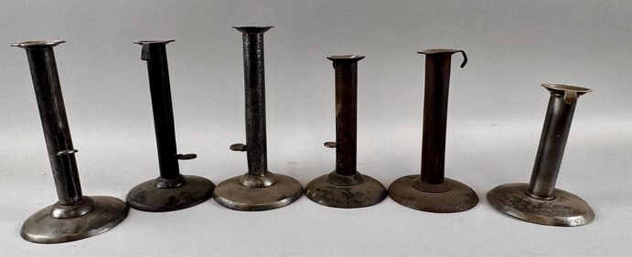 SIX METAL HOG SCRAPER CANDLESTICKS Early 19th Century Heights from 5" to 7.5".