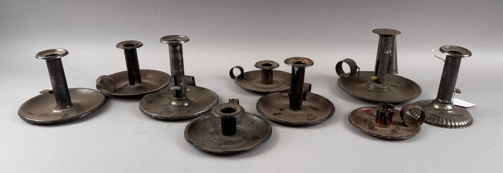 NINE TIN CANDLE HOLDERS 19th Century Heights from 2.25" to 5". (1 of 6)