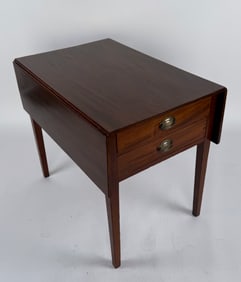 TWO-DRAWER DROP-LEAF MAHOGANY STAND 19th Century Height 28". Width 32" plus two 10" drop leaves.