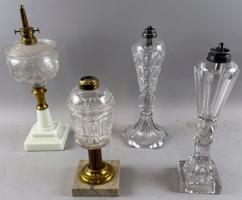 FOUR CLEAR GLASS WHALE OIL LAMPS 19th Century Heights from 10" to 14.5".