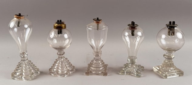 FIVE CLEAR GLASS WHALE OIL LAMPS 19th Century Heights from 6.75" to 7".