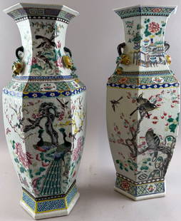PAIR OF CHINESE FAMILLE ROSE PORCELAIN HEXAGONAL BALUSTER VASES Mid-19th Century Heights 24".: PAIR OF CHINESE FAMILLE ROSE PORCELAIN HEXAGONAL BALUSTER VASESMid-19th CenturyFinely detailed decoration of exotic birds in a landscape. Applied pomegranate and vine handles.Heights 24".