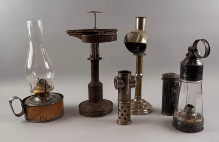 SIX TIN AND METAL LIGHTING DEVICES 19th Century Heights from 7" to 15".