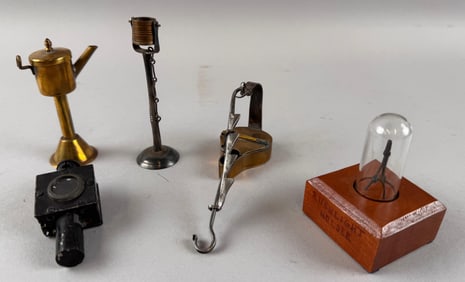 FIVE MINIATURE LIGHTING ITEMS 19th/20th Century Heights from 2.5" to 2.75".