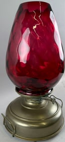 NICKEL-PLATED OIL LAMP WITH RUBY GLASS SHADE 19th Century, Total height 20".