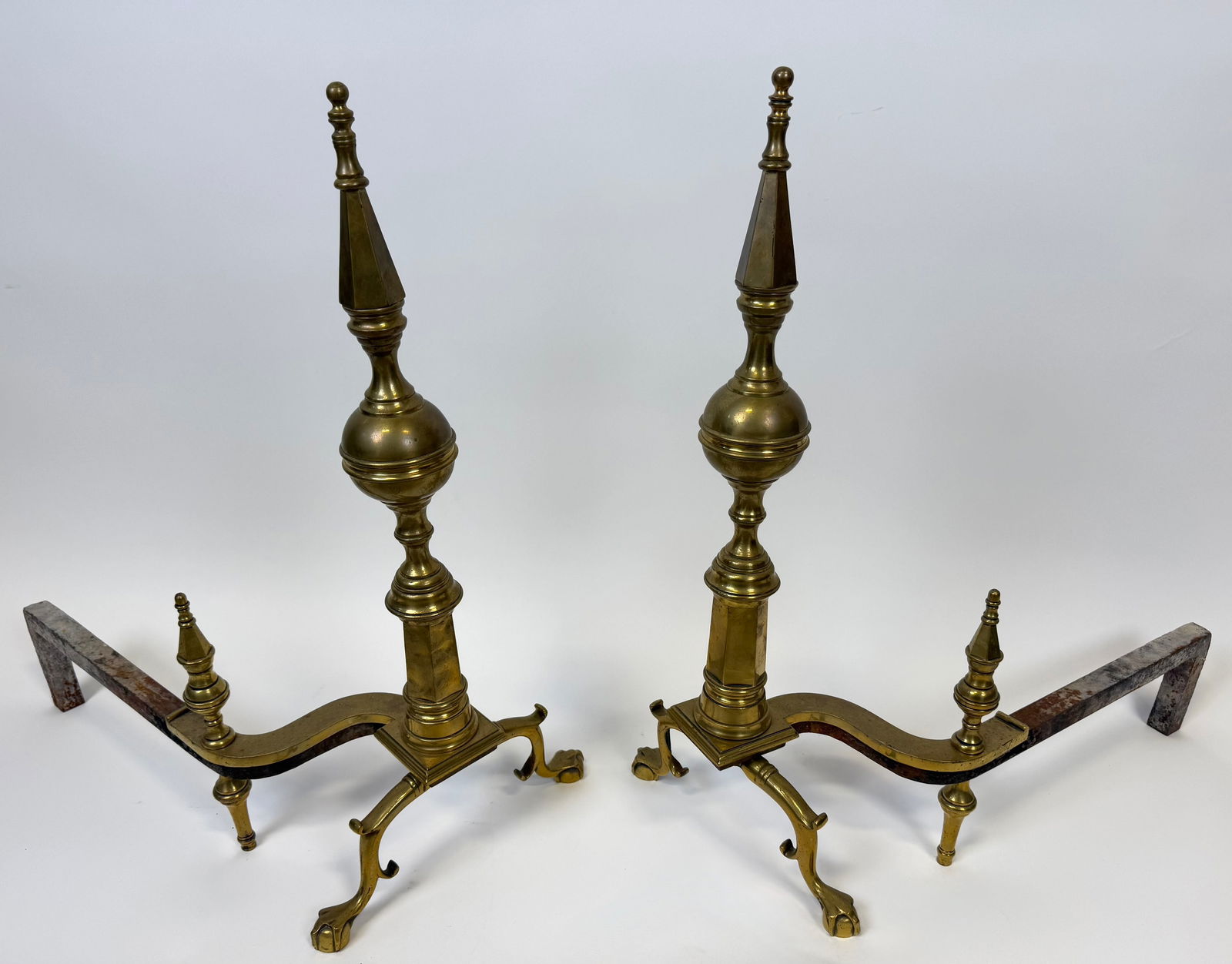 PAIR OF HEAVY BRASS CHIPPENDALE-STYLE ANDIRONS Late 19th/Early 20th Century Heights 27". Depths 23". (1 of 1)