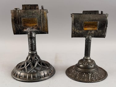 PAIR OF UFFORD TIN AND CAST IRON LAMPS Mid-19th Century Heights approx. 8.5".