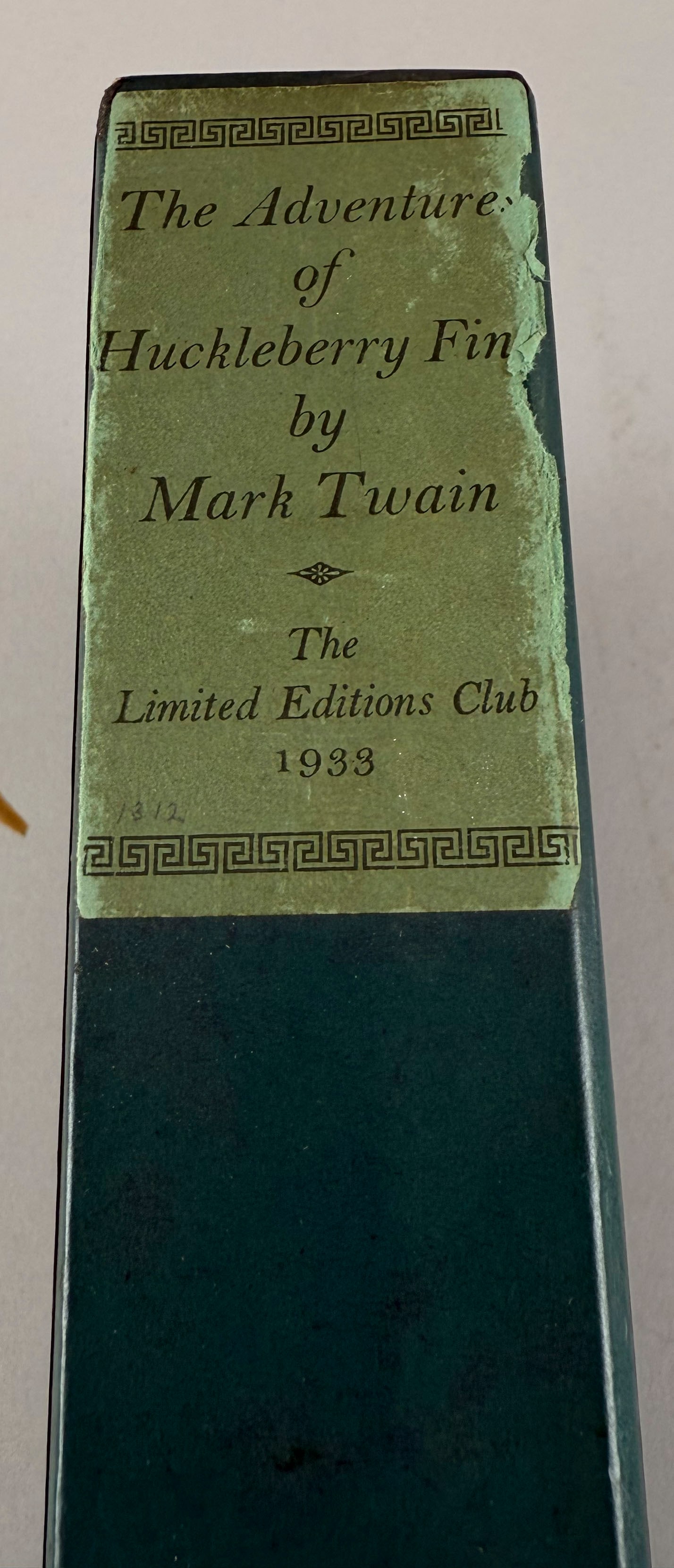 "THE ADVENTURES OF HUCKLEBERRY FINN" BY MARK TWAIN 10" x 7".: "THE ADVENTURES OF HUCKLEBERRY FINN" BY MARK TWAIN N.Y.: for The Limited Editions Club, 1933. Numbered 1312 of 1500. Signed by designer Carl Purington Rollins. Original green slipcase. 10" x 7".