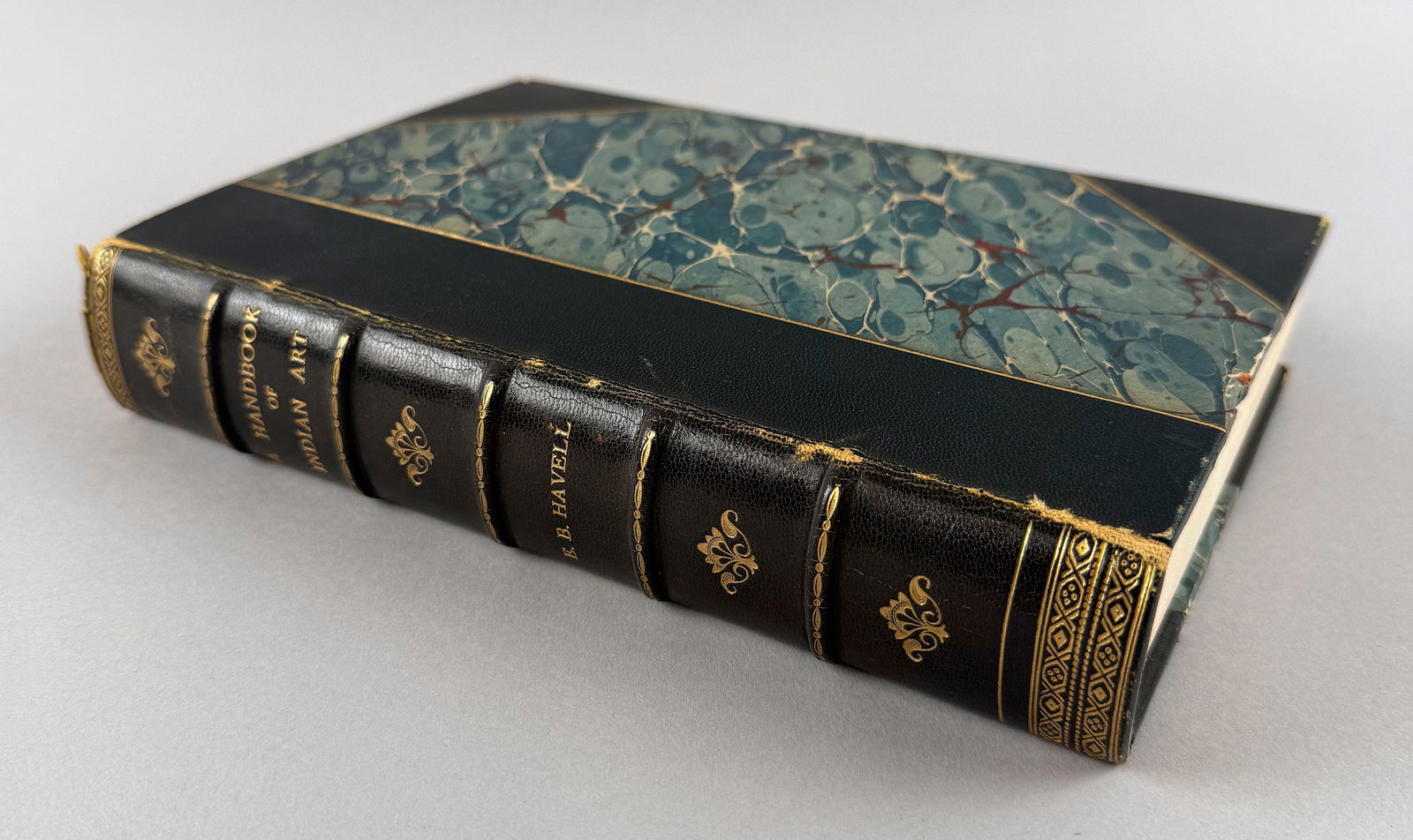 "A HANDBOOK OF INDIAN ART" BY ERNEST BINFIELD HAVELL: "A HANDBOOK OF INDIAN ART" BY ERNEST BINFIELD HAVELLLondon: John Murray, 1927. Second edition. Half-calf binding with marbled boards. Gilt spine. Octavo.
