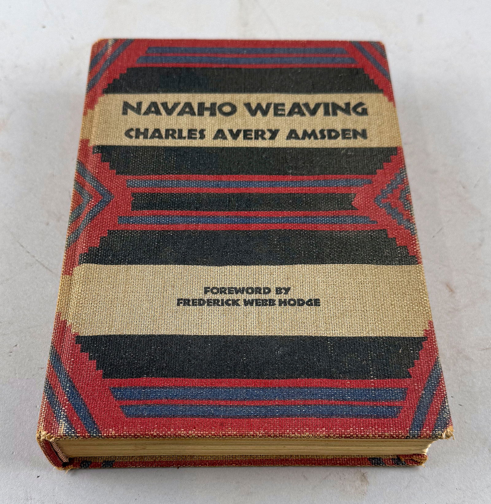 "NAVAHO WEAVING" BY CHARLES AVERY AMSDEN 9.5" x 6.75".: "NAVAHO WEAVING" BY CHARLES AVERY AMSDENSanta Ana, Calif.: The Fine Arts Press in cooperation with The Southwest Museum, 1934.9.5" x 6.75".