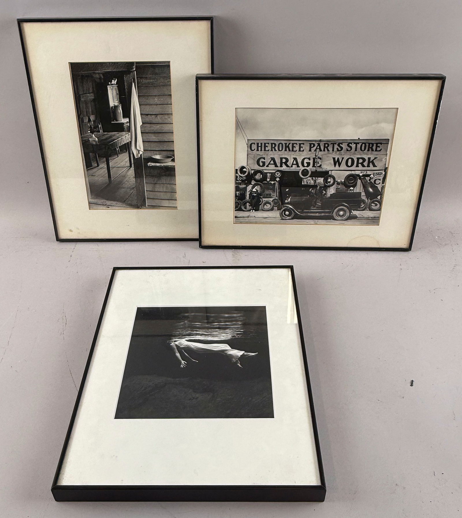 THREE REPRODUCTION PHOTOGRAPHS 20th Century Largest 7.5" x 9.25". Framed 11" x 14".: THREE REPRODUCTION PHOTOGRAPHS20th CenturyMade from the negatives in the collection of the Library of Congress. Includes:1) "Cabin Interior".2) "Atlanta Garage" by Walker Evans.3) "Midsummer Night's D