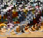 TORRIE DORSEY (Maine, Contemporary), Four women on bicycles., Acrylic on canvas, 26" x 30". Framed