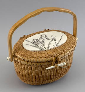 GERALD L. BROWN NANTUCKET BASKET PURSE 20th Century Height to rim 5.25". Height with handle raised: GERALD L. BROWN NANTUCKET BASKET PURSE20th CenturySigned on base.Height to rim 5.25". Height with handle raised 9".