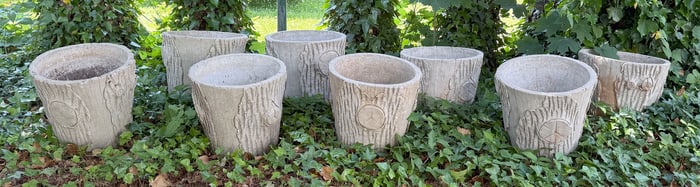 EIGHT FRENCH CANADIAN CAST CONCRETE FAUX BOIS PLANTERS, 20th Century Heights 15". Diameters 16".