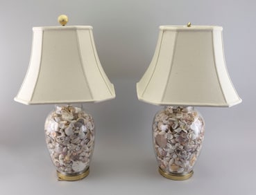 PAIR OF CLEAR GLASS TABLE LAMPS FILLED WITH SEASHELLS 20th/21st Century Base heights 15". Total