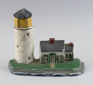 CAST IRON HIGHLAND LIGHT DOORSTOP 20th Century Length 7.5".
