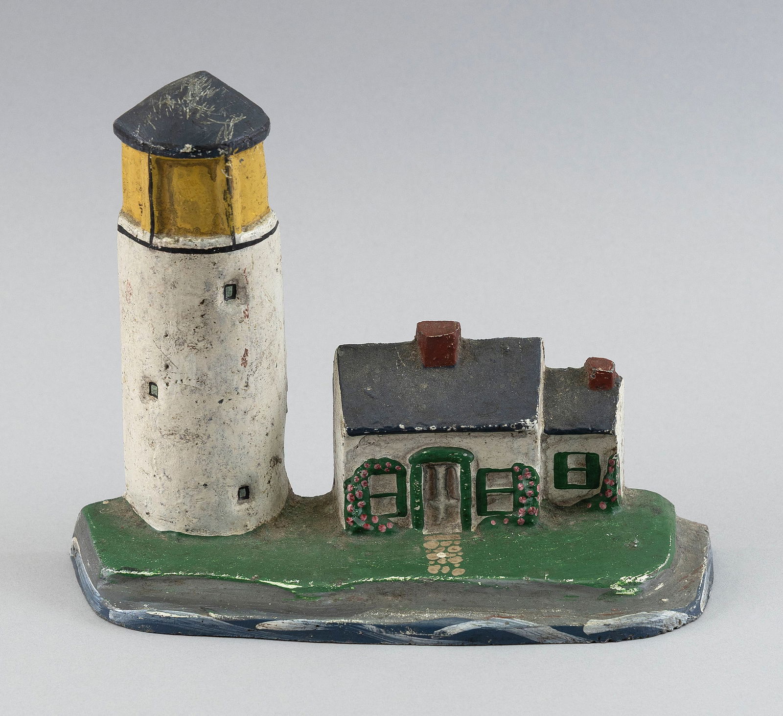 CAST IRON HIGHLAND LIGHT DOORSTOP 20th Century Length 7.5".: CAST IRON HIGHLAND LIGHT DOORSTOP20th CenturyOriginal paint.Length 7.5".