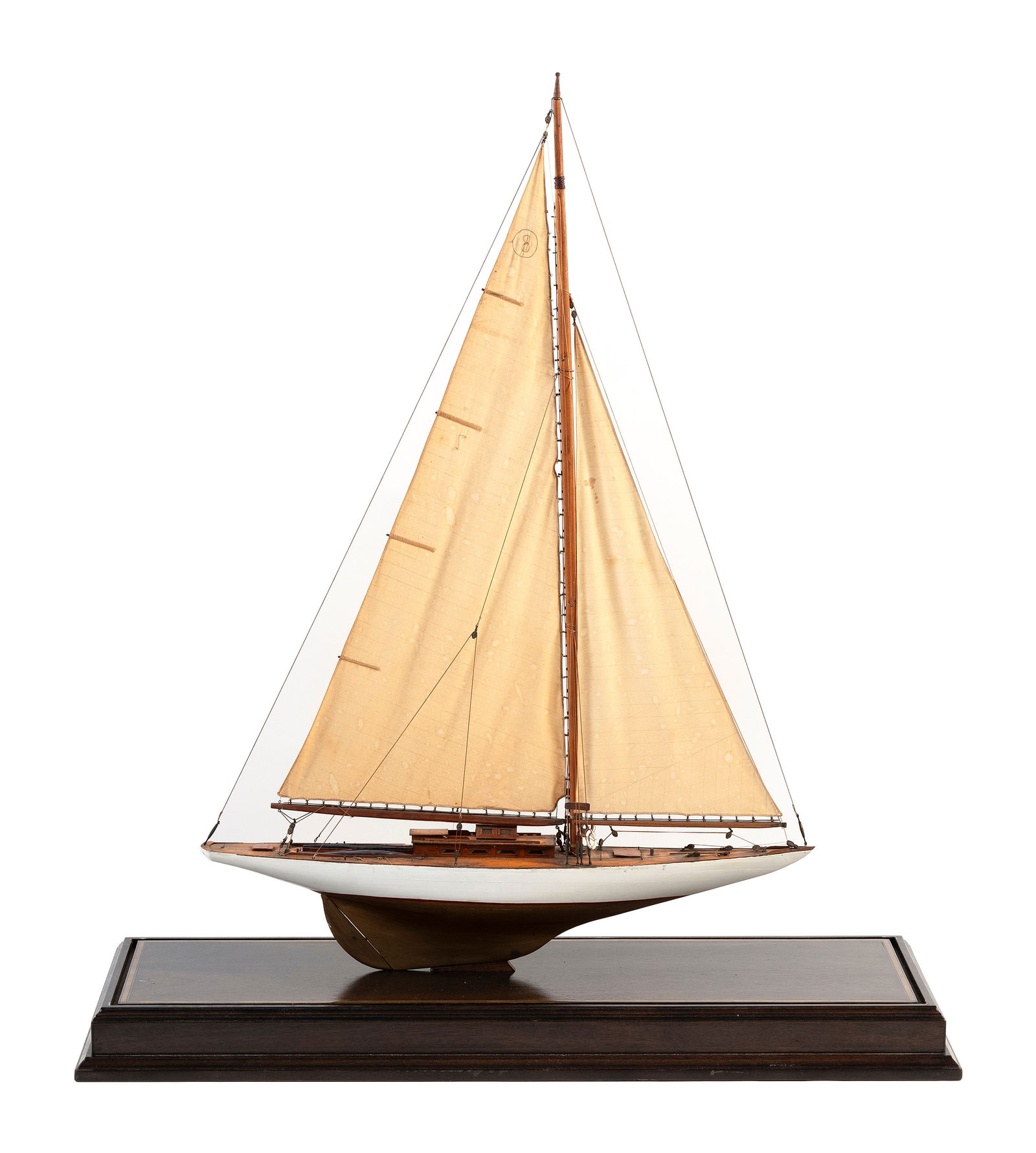 CASED MODEL OF THE YACHT "WINDWARD" 20th Century Case height 39". Length 33". Width 11".: CASED MODEL OF THE YACHT "WINDWARD"20th CenturyVessel with white hull and "8" sail. Displayed within a glass and brass case with wooden base.Case height 39". Length 33". Width 11".