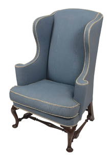 QUEEN ANNE WALNUT EASY CHAIR Rhode Island, Dated 1735/6 Back height 47.5". Seat height 14". Width: QUEEN ANNE WALNUT EASY CHAIRRhode Island, Dated 1735/6Arched crest continuing to S-scrolled wings and scrolled arms. Curving front rail. Cabriole legs joined by block and turned stretchers and end in