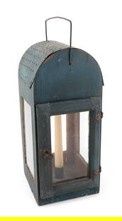 CANDLE LANTERN Late 18th/Early 19th Century Height 16.5". Width 7.25". Depth 7.5".: CANDLE LANTERNLate 18th/Early 19th CenturyPainted dark green. Pine body with punched tin barrel top, four glazed panels, and rudimentary iron handle, hinges and door latch. Punched tin candle holder n