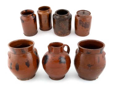 SEVEN PIECES OF LEAD-GLAZED REDWARE New England, Early 19th Century Heights to 10.75".