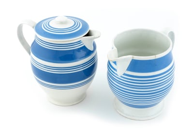 TWO BLUE AND WHITE STRIPED MOCHAWARE PITCHERS England, 19th Century Heights 7" and 9".
