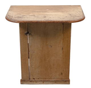 HARVARD SHAKER COMMUNITY PAINTED PINE WORK TABLE Harvard, Massachusetts, 19th Century Height 31".: HARVARD SHAKER COMMUNITY PAINTED PINE WORK TABLEHarvard, Massachusetts, 19th CenturyOchre-colored grain-painted finish. D-shaped overhanging top. Cabinet base with latching door and two interior shelv