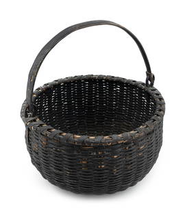 SPLINTWORK GATHERING BASKET Probably New England, 19th Century Height to rim 8". Diameter 15".: SPLINTWORK GATHERING BASKETProbably New England, 19th CenturyPainted dark blue-black. Bentwood swing handle. X-wrapped rim. High concave base.Height to rim 8". Diameter 15". Provenance:The Collection