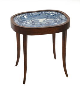 BLUE AND WHITE STAFFORDSHIRE PLATTER, FITTED AS A STAND England, 19th Century 16" x 12". Stand: BLUE AND WHITE STAFFORDSHIRE PLATTER, FITTED AS A STANDEngland, 19th CenturyPlatter depicts cattle in a classical landscape.16" x 12". Stand height 18.5". Provenance:The Collection of Arun and Barbara