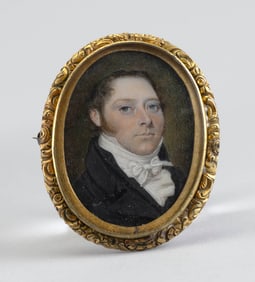 PORTRAIT MINIATURE OF A GENTLEMAN IN A BLACK COAT America or Britain, Early 19th Century Watercolor