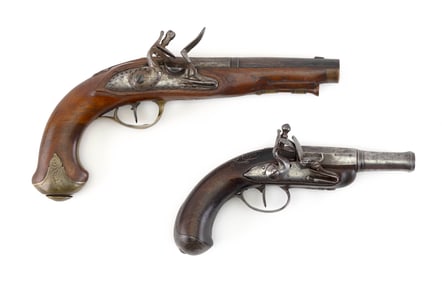 TWO FLINTLOCK PISTOLS Late 18th Century Length of barrels 4" and 5.5". Total lengths 8" and 10.5".
