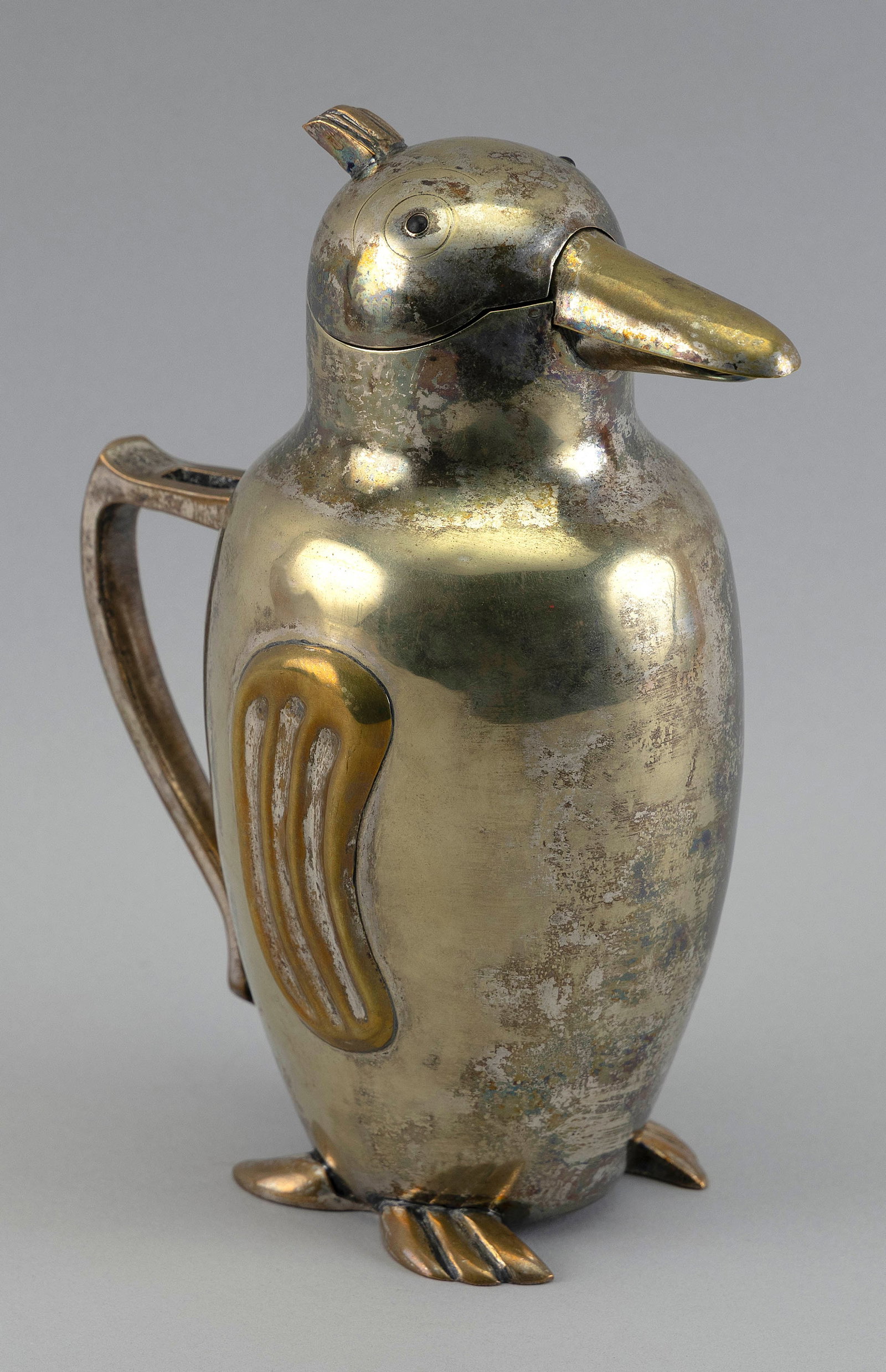 ART DECO SILVER PLATED PENGUIN COCKTAIL PITCHER 20th Century Height 9.5".: ART DECO SILVER PLATED PENGUIN COCKTAIL PITCHER 20th Century Mechanical beak. Height 9.5".
