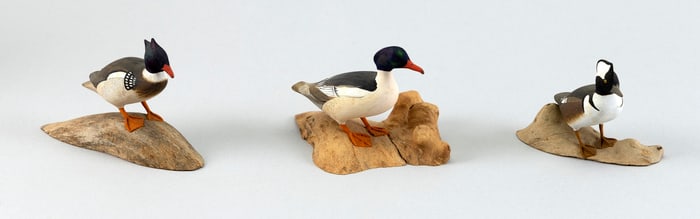 THREE HAROLD NELSON GIBBS MINIATURE MERGANSERS Barrington, Rhode Island, 1886-1970 Heights from 2.5"