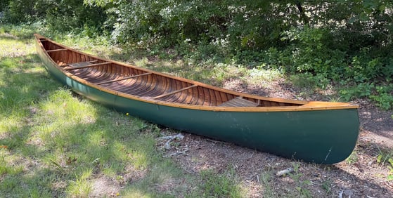 VINTAGE CANOE Early 20th Century Length approx. 21'0".