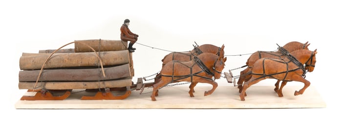 FOLK ART CARVING OF A HORSE-DRAWN LOGGING SLED Maine, Late 19th Century Height 15". Length 52".