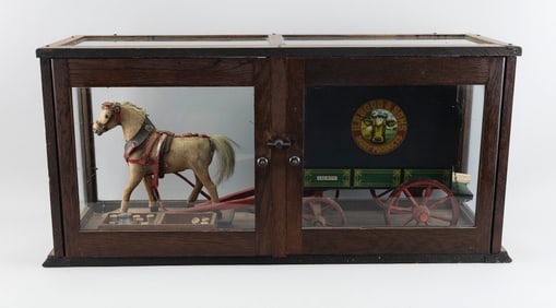 SCHOENHUT H.P. HOOD & SONS HORSE-DRAWN MILK WAGON PULL TOY Circa 1910 Case height 15". Length 30.5".