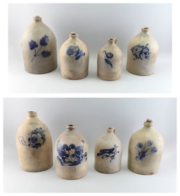 EIGHT BENNINGTON STONEWARE JUGS Bennington, Vermont, 19th Century Heights from 12" to 17".