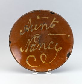 PENNSYLVANIA REDWARE PLATE WITH SLIP DECORATION 19th Century Diameter 12".